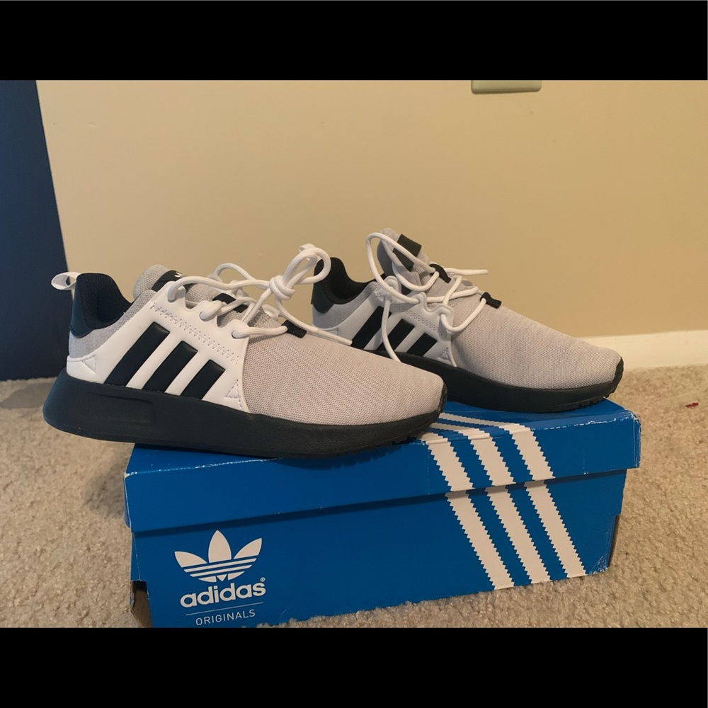 Never worn kids Adidas shoes